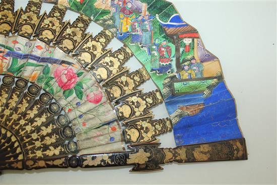 A Chinese applique work painted leaf and gilt decorated black lacquer fan, 19th century, 31cm